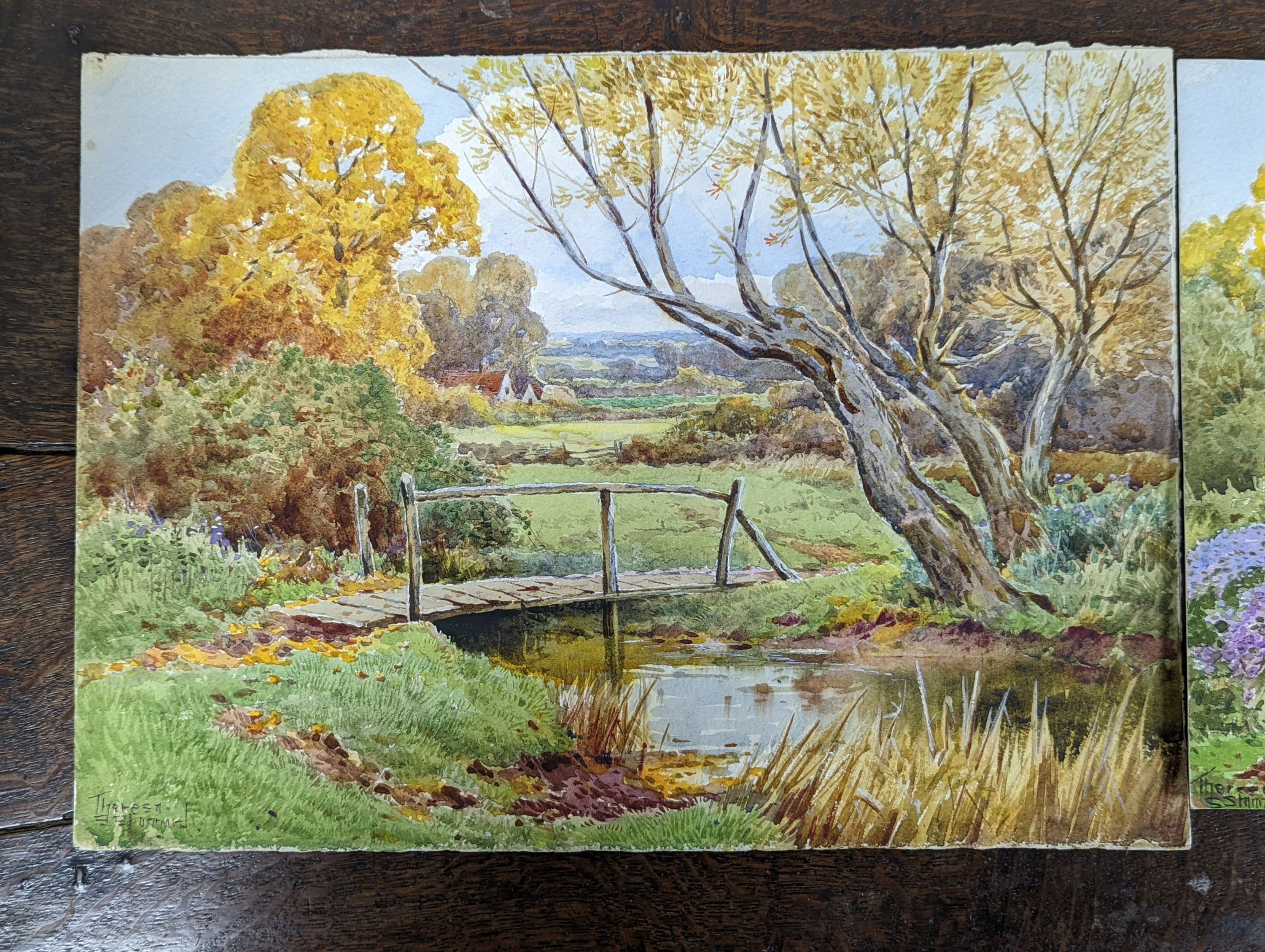 Theresa S. Stannard (1898-1947), two watercolours, stream and bridge & lake with boathouse, signed, 25 x 35cm & 27 x 36cm. both unframed.